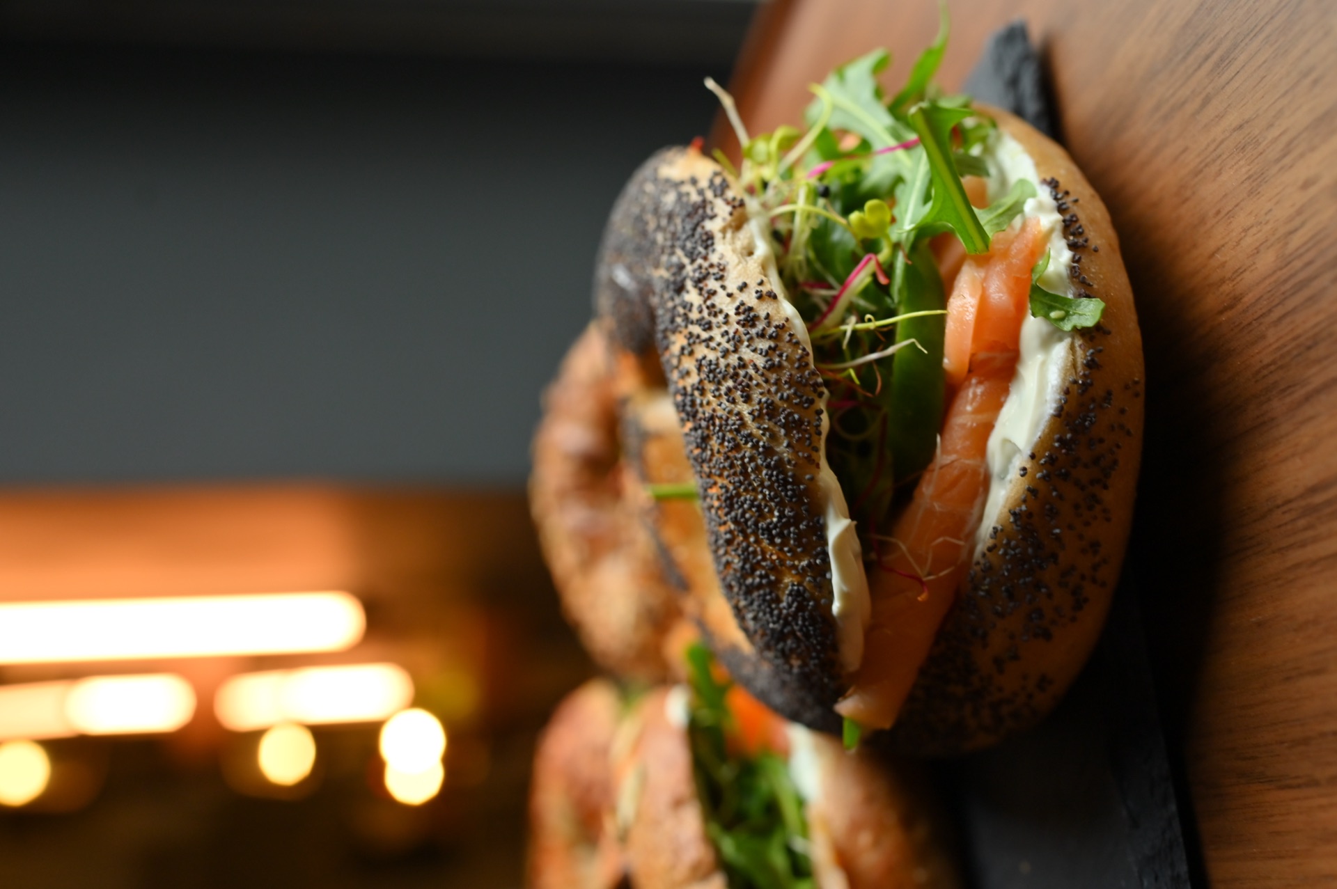 Poppy seed bagel with salmon closeup
